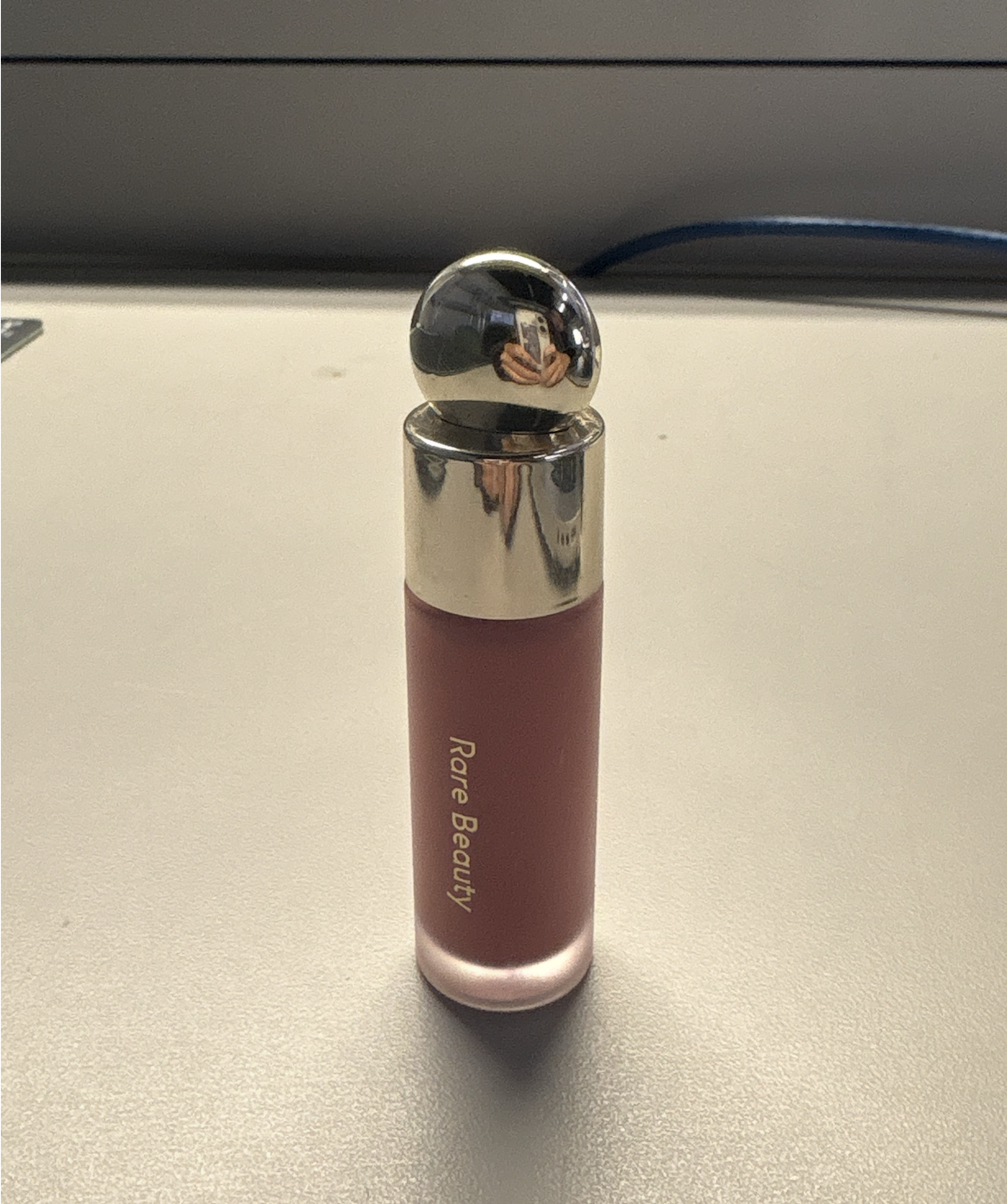 A vibrant blush color designed for easy application. The project examines how form and material can influence the user experience.